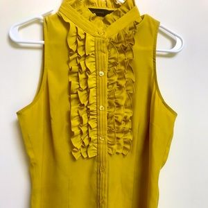 Ruffled sleeveless blouse